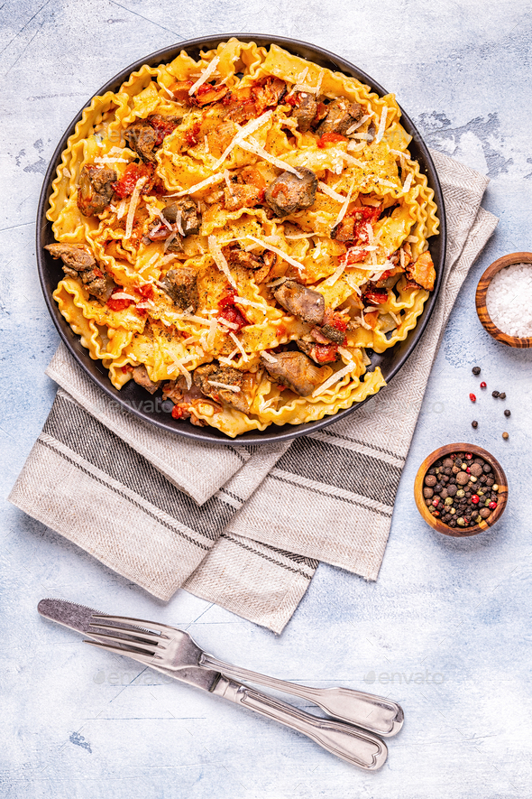 Pasta with chicken liver sauce. Stock Photo by tatiana_bralnina PhotoDune
